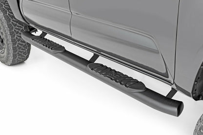 Fits Toyota Tacoma 2WD/4WD (2005-2023) Oval Nerf Step; Double Cab; Black; 21008