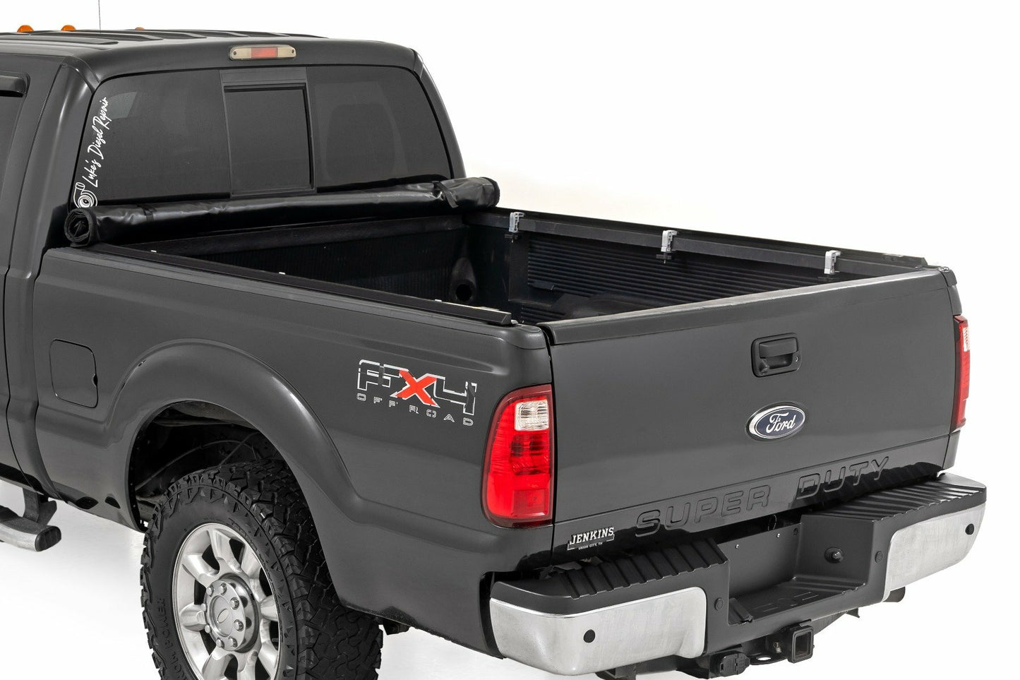 Fits Ford F-250/F-350 SD (99-16) Soft Roll Up Bed Cover; 6'10" Bed; 42599650