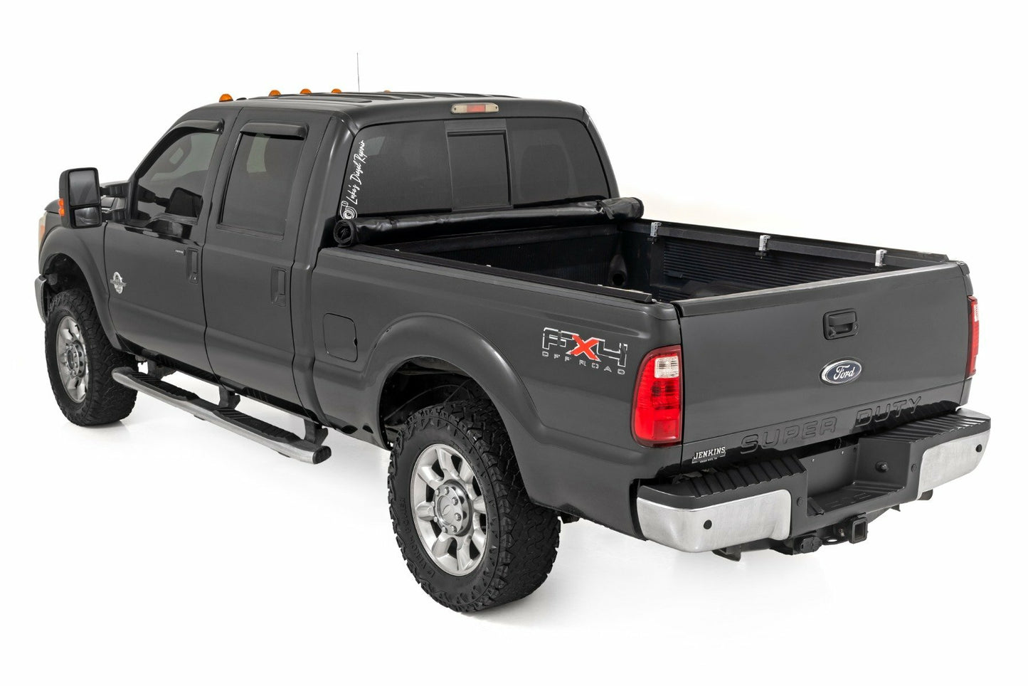 Fits Ford F-250/F-350 SD (99-16) Soft Roll Up Bed Cover; 6'10" Bed; 42599650