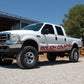 Fits Ford F-250/F-350 Super Duty 4WD (1999) 4 Inch Lift Kit; Rear Blocks; 49430