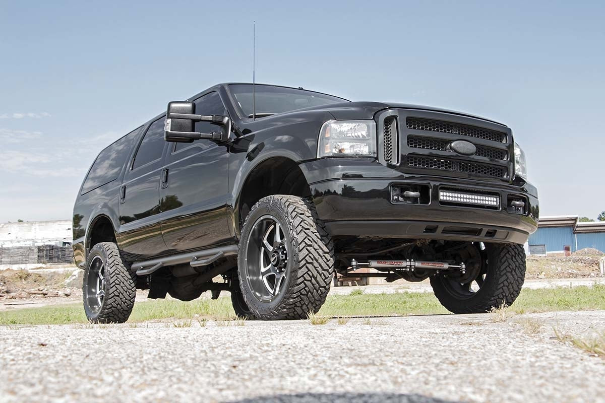 Fits Ford F-250/F-350 SD 4WD (99-04) 2" Leveling Kit; Leaf Block; 49800