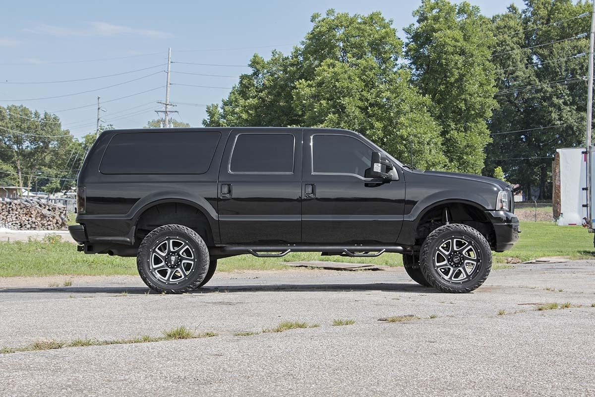 Fits Ford Excursion 4WD (2000-2005) 2 Inch Leveling Kit; Leaf Block; 49800_A