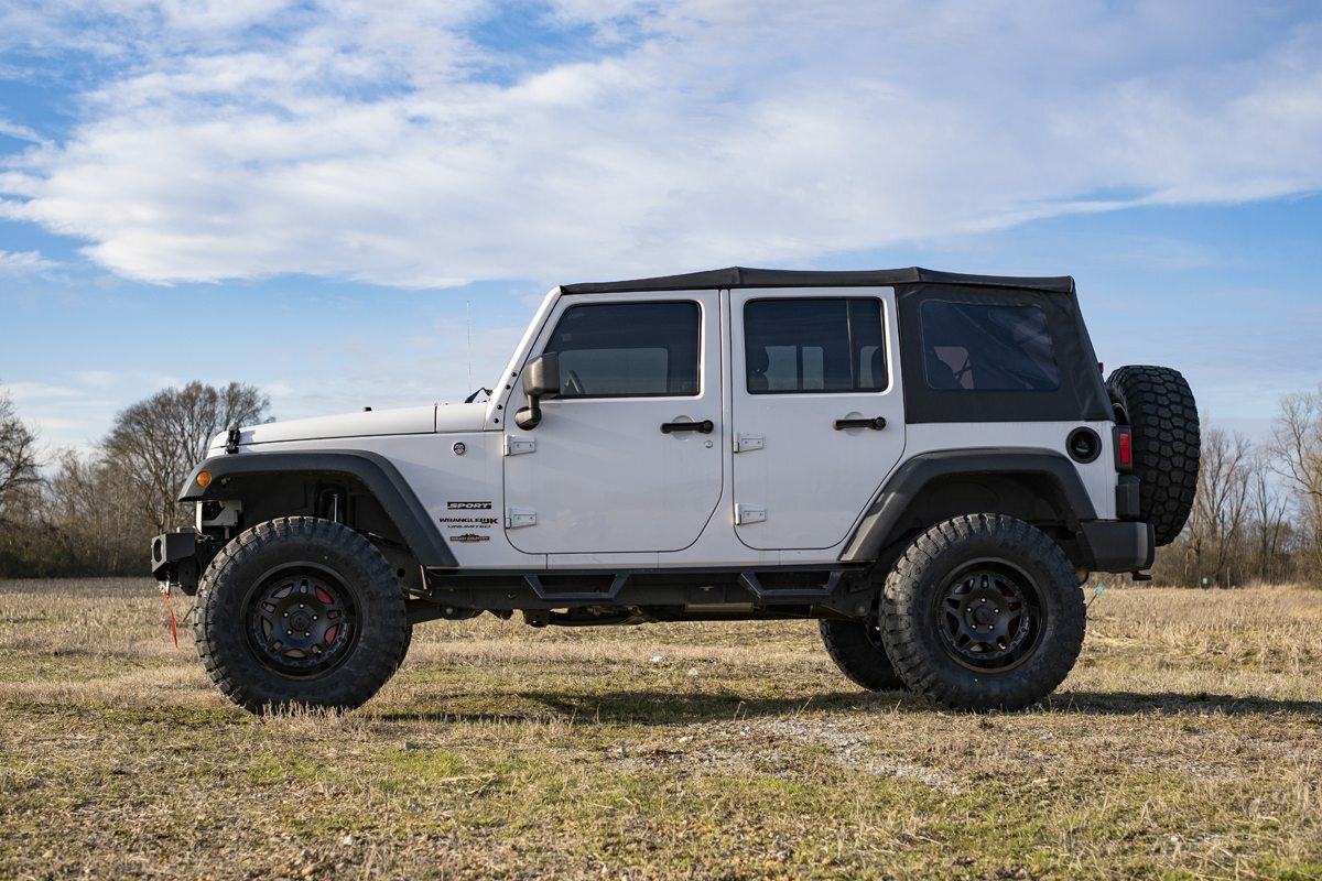 Fits Jeep Wrangler Unlimited 2WD/4WD (2007-2018) 3.25 Inch Lift Kit; M1; 66940