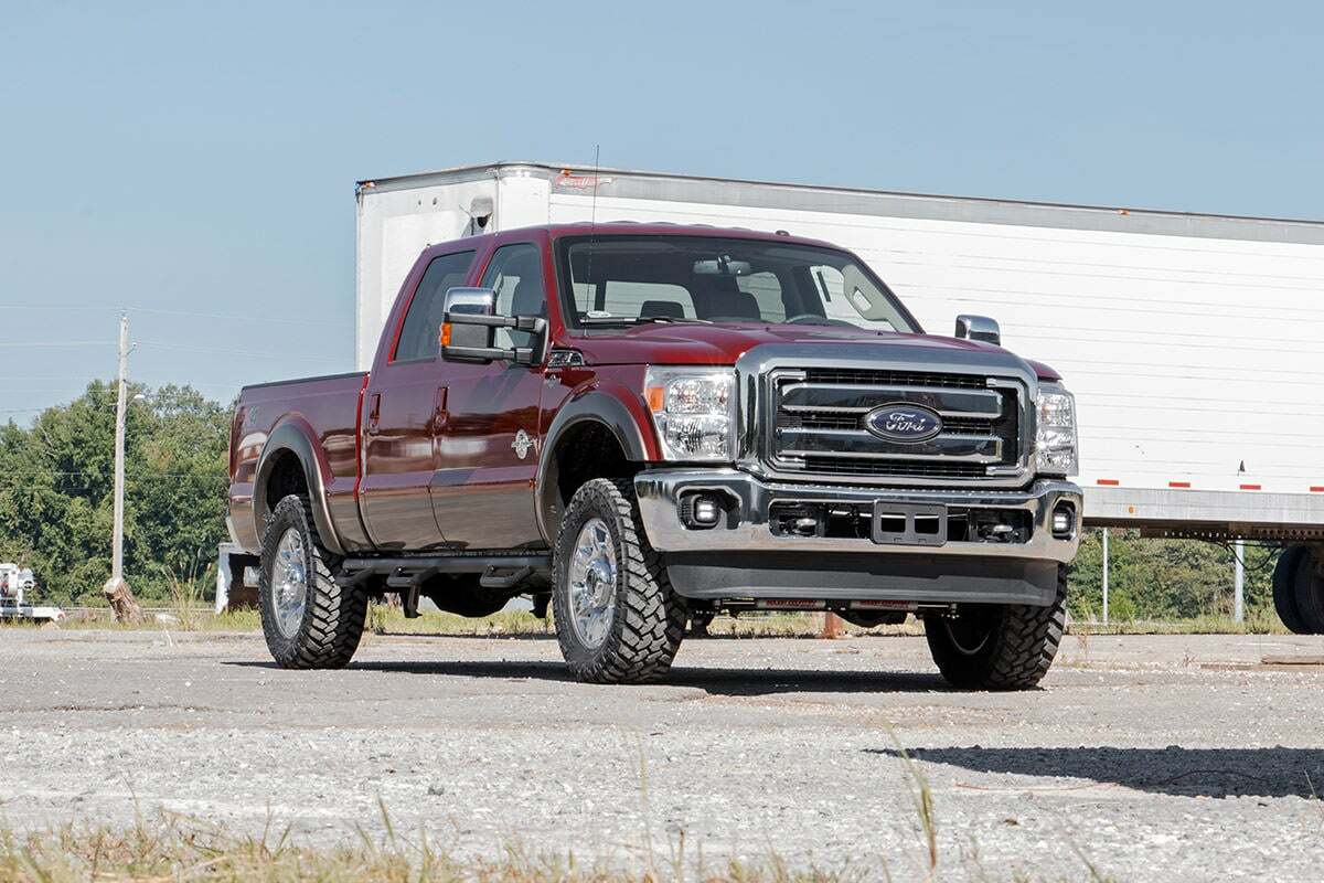 Fits Ford F-250/F-350 SD (11-16) LED Light Kit; Fog Mount; 2" Black Pair; 70622