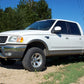 Fits Ford F-150 4WD (1997-2003) 2.5 Inch Leveling Kit; 7544