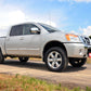 Fits Nissan Titan 2WD/4WD (2004-2024) 2 Inch Leveling Kit; Red Spacers; 863RED
