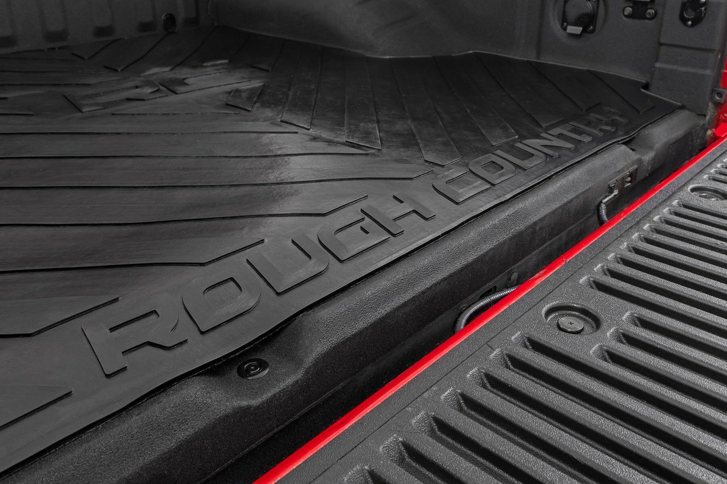 Fits Nissan Frontier 2WD/4WD (2005-2024) Bed Mat; 5' Bed; RC Logo; RCM525