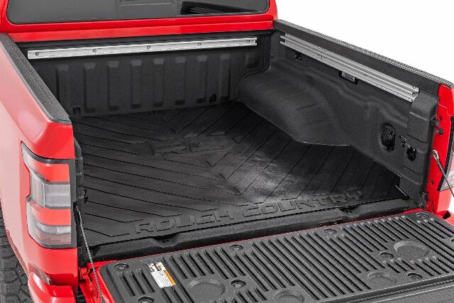 Fits Nissan Frontier 2WD/4WD (2005-2024) Bed Mat; 5' Bed; RC Logo; RCM525